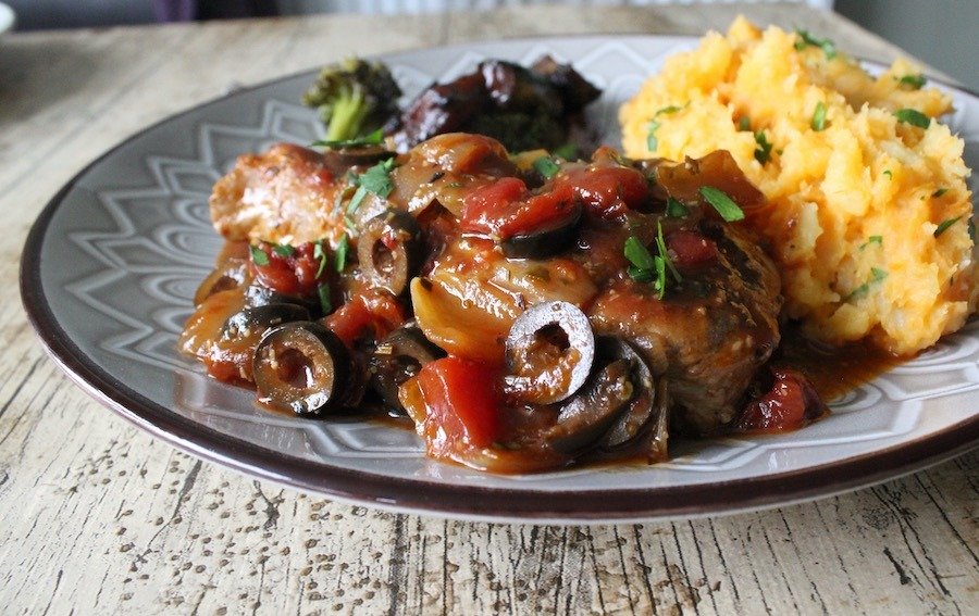 plate of pan-fried country pork and mashed potato