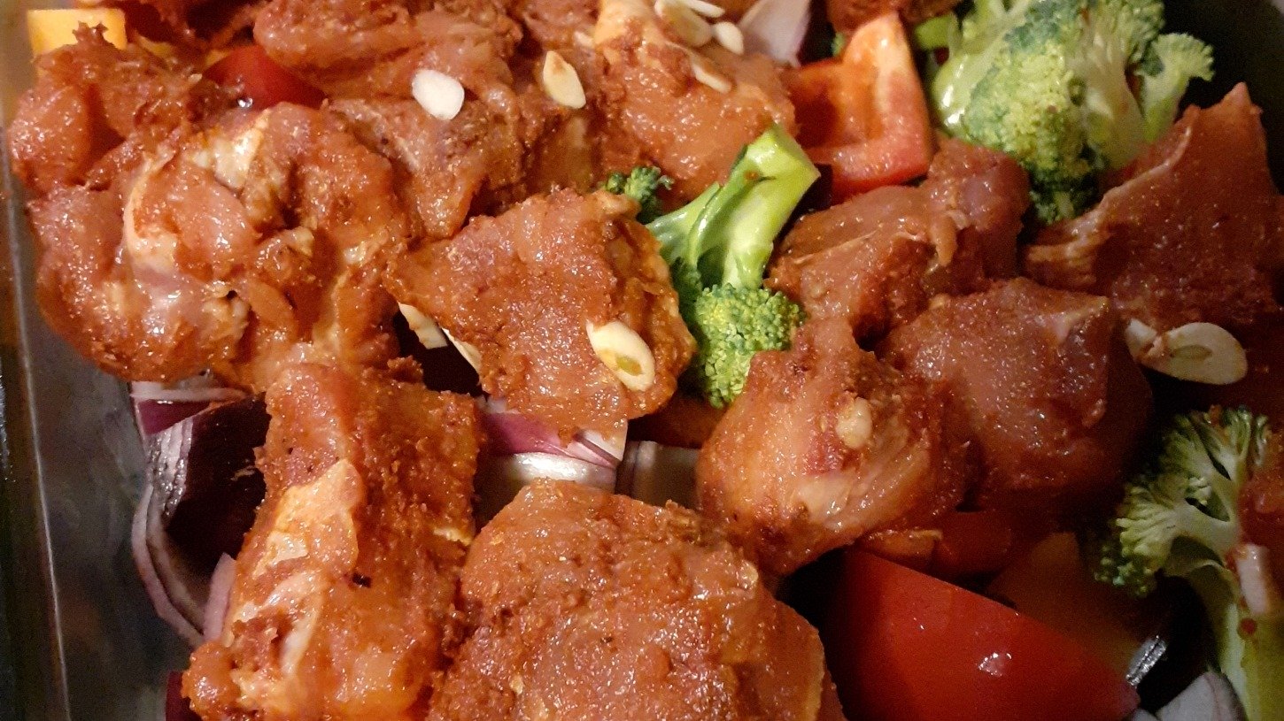 Pork tray bake made with Case for Cooking Rose Harissa spice blend